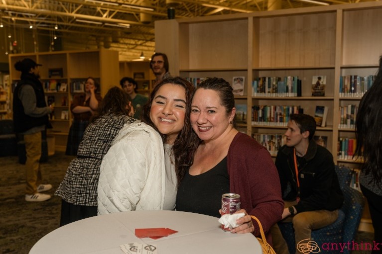 Attendees at an Unstudied event pose for the camera.